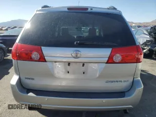 2010 Toyota Sienna XLE with VIN 5TDYK4CC3AS324570, listed as a Copart auction lot 60474005 with 259,128 mi miles and Salvage title. Bid and sale history available at DreamBid. Image 6.