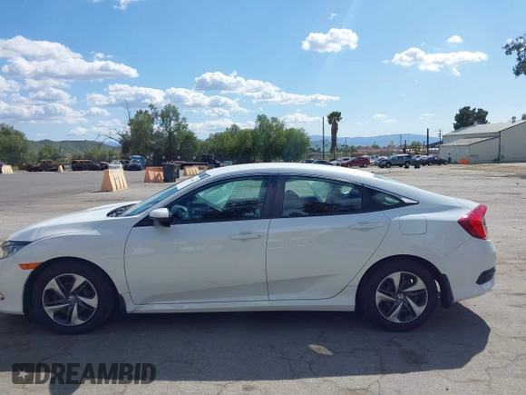 2020 Honda Civic Sedan LX with VIN 19XFC2F64LE201551, listed as a IAAI auction lot 41939055 with 67,461 mi miles. Bid and sale history available at carsss.com. Image 14.