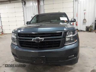 2019 Chevrolet Suburban Premier with VIN 1GNSKJKJ8KR169252, listed as a IAAI auction lot 41472231 with 95,266 mi miles and . Bid and sale history available at DreamBid. Image 12.