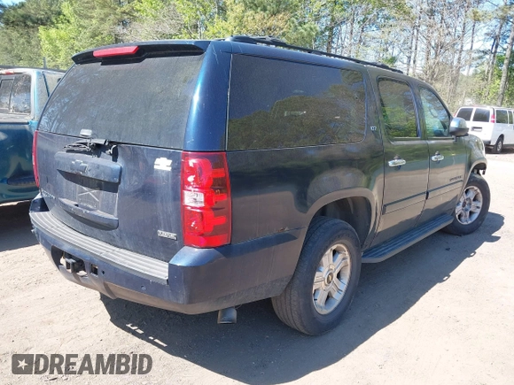 2008 Chevrolet Suburban LT w/3LT with VIN 1GNFK16368J138876, listed as a IAAI auction lot 42039588 with 318,374 mi miles. Bid and sale history available at carsss.com. Image 4.