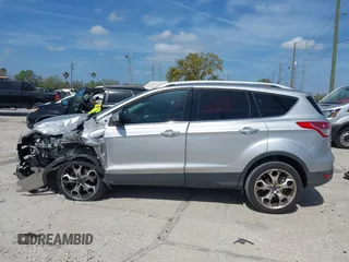 2014 Ford Escape Titanium с VIN 1FMCU0J9XEUB93591, выставлен на аукционе IAAI как лот 41721869 с пробегом 98 859 миль миль и . История ставок и продаж доступна на DreamBid. Изображение 14.