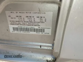 2006 Mazda 3 i with VIN JM1BK12F361418825, listed as a IAAI auction lot 41139654 with Not Provided miles. Bid and sale history available at carsss.com. Image 9.