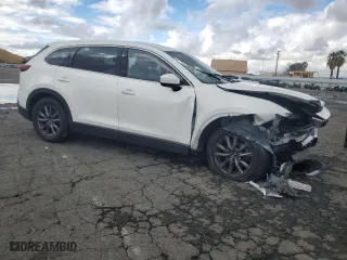 2021 Mazda CX-9 Touring with VIN JM3TCACY5M0527069, listed as a Copart auction lot 43014655 with 0 mi miles and Salvage Title. Bid and sale history available at carsss.com. Image 4.