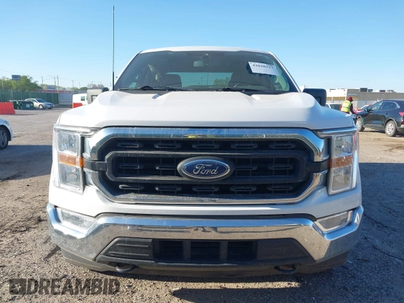 2021 Ford F-150 XL with VIN 1FTEW1EP5MKE25613, listed as a IAAI auction lot 42028237 with 116,341 mi miles. Bid and sale history available at carsss.com. Image 6.