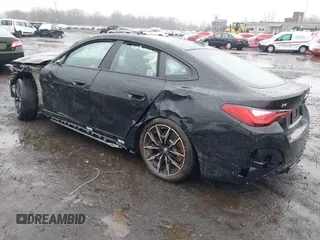 2024 BMW i4 M50 z VIN WBY33AW00RFS06591, wystawiony jako IAAI lot #41863252 z przebiegiem 15 260 mil mil oraz . Historia ofert i sprzedaży dostępna na DreamBid. Obrazek 3.