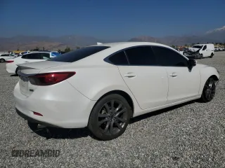 2016 Mazda 6 i Grand Touring с VIN JM1GJ1W53G1404533, выставлен на аукционе Copart как лот 46860575 с пробегом 94 105 миль миль и Списание • Salvage title. История ставок и продаж доступна на DreamBid. Изображение 3.