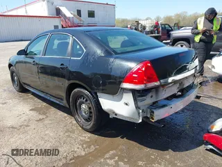 2014 Chevrolet Impala Limited Police Police with VIN 2G1WD5E30E1187288, listed as a IAAI auction lot 41965715 with 91,436 mi miles. Bid and sale history available at carsss.com. Image 3.