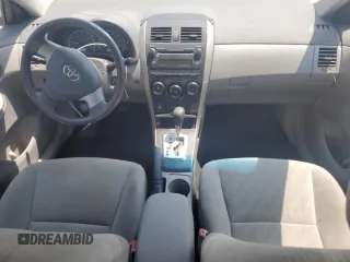 2010 Toyota Corolla with VIN 1NXBU4EE6AZ306666, listed as a Copart auction lot 58370215 with 128,586 mi miles and Salvage title. Bid and sale history available at DreamBid. Image 8.