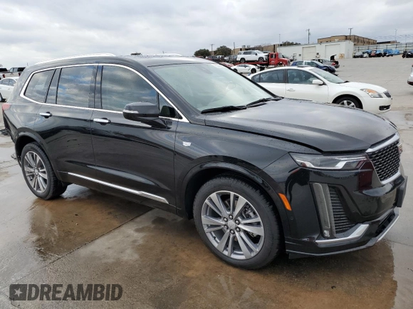 2021 Cadillac XT6 Premium Luxury z VIN 1GYKPCRS6MZ207546, wystawiony jako Copart lot #85995814 z przebiegiem 30 885 mil mil oraz Czysty tytuł • Clean title. Historia ofert i sprzedaży dostępna na DreamBid. Obrazek 4.