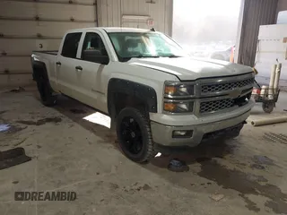 2014 Chevrolet Silverado 1500 LT with VIN 1GCUKREC4EF193227, listed as a IAAI auction lot 41323597 with 189,886 mi miles and . Bid and sale history available at DreamBid. Image 1.