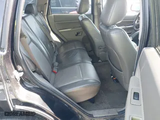 2009 Jeep Grand Cherokee Laredo with VIN 1J8GS48K59C548330, listed as a IAAI auction lot 41887548 with 184,434 mi miles. Bid and sale history available at carsss.com. Image 8.