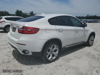 2014 BMW X6 xDrive35i with VIN 5UXFG2C53E0C44534, listed as a Copart auction lot 56518074 with 141,924 mi miles and Salvage Title. Bid and sale history available at carsss.com. Image 3.