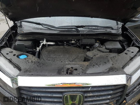 2023 Honda Ridgeline RTL with VIN 5FPYK3F51PB067811, listed as a Copart auction lot 56795995 with 21,500 mi miles and Salvage title. Bid and sale history available at DreamBid. Image 11.