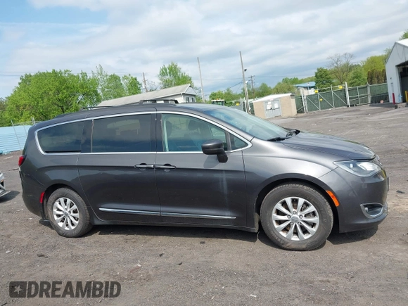2017 Chrysler Pacifica Touring L with VIN 2C4RC1BG5HR705277, listed as a IAAI auction lot 42230036 with 75,287 mi miles and . Bid and sale history available at DreamBid. Image 13.