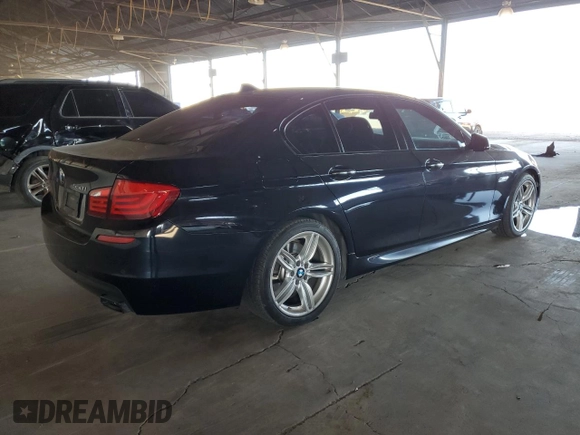 2013 BMW 5 Series 550i with VIN WBAFR9C5XDD226635, listed as a Copart auction lot 74282014 with 71,010 mi miles and Clean Title. Bid and sale history available at DreamBid. Image 3.