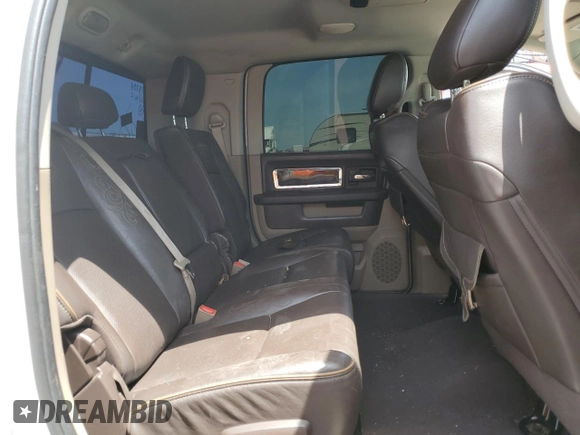 2012 Ram 2500 Laramie Limited z VIN 3C6UD5PL5CG173734, wystawiony jako Copart lot #56576995 z przebiegiem 296 460 mil mil oraz Czysty tytuł • Clean title. Historia ofert i sprzedaży dostępna na DreamBid. Obrazek 10.