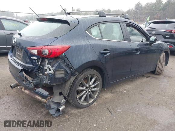 2018 Mazda 3 Touring with VIN 3MZBN1L34JM204883, listed as a IAAI auction lot 41094541 with 125,205 mi miles and . Bid and sale history available at DreamBid. Image 4.