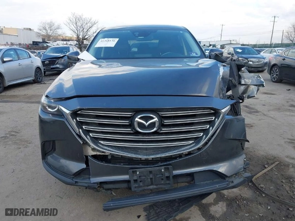 2016 Mazda CX-9 Touring with VIN JM3TCBCY2G0119056, listed as a IAAI auction lot 41268136 with NaN miles. Bid and sale history available at carsss.com. Image 11.