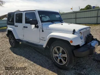 2018 Jeep Wrangler JK Unlimited Sahara with VIN 1C4HJWEG7JL910656, listed as a Copart auction lot 73414244 with 50,519 mi miles and Salvage Title. Bid and sale history available at carsss.com. Image 4.