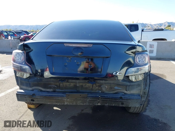 2015 Scion tC with VIN JTKJF5C79FJ003404, listed as a IAAI auction lot 41756024 with 128,906 mi miles. Bid and sale history available at carsss.com. Image 16.
