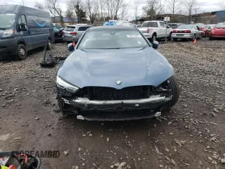 2020 BMW 8 Series 840i with VIN WBAGV4C00LCD53148, listed as a Copart auction lot 38031863 with 61,742 mi miles. Bid and sale history available at carsss.com. Image 5.