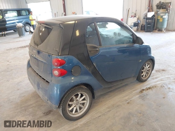 2009 Smart fortwo Pure with VIN WMEEJ31X89K228315, listed as a IAAI auction lot 42662931 with 60,666 mi miles and . Bid and sale history available at DreamBid. Image 4.
