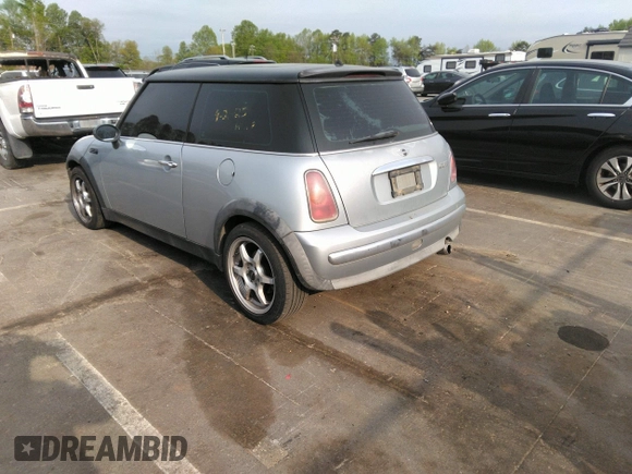 2002 MINI Hardtop with VIN WMWRC33432TE10226, listed as a IAAI auction lot 41973956 with 156,445 mi miles and . Bid and sale history available at DreamBid. Image 3.