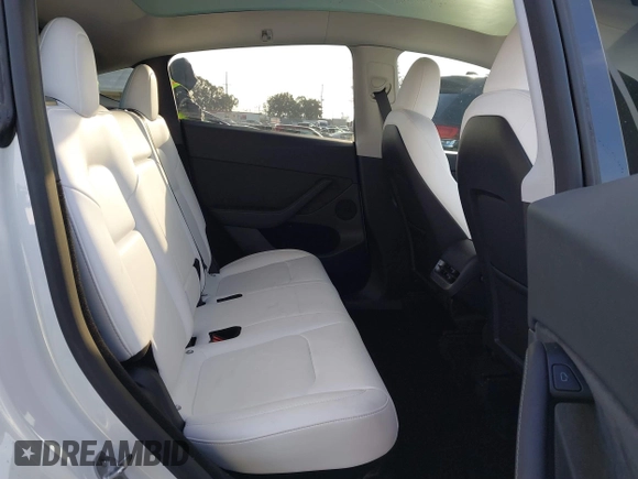 2023 Tesla Model Y Performance with VIN 7SAYGDEF0PF839468, listed as a IAAI auction lot 41609263 with 25,434 mi miles and . Bid and sale history available at DreamBid. Image 8.