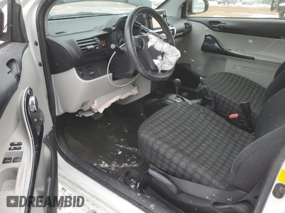 2014 Scion iQ with VIN JTNJJXB09EJ030330, listed as a Copart auction lot 45241105 with 46,879 mi miles and Salvage title. Bid and sale history available at DreamBid. Image 8.