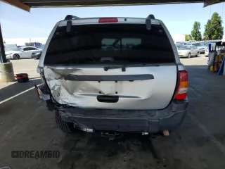 2003 Jeep Grand Cherokee Laredo with VIN 1J4GW48S23C617830, listed as a Copart auction lot 57481565 with 122,745 mi miles and Salvage title. Bid and sale history available at DreamBid. Image 6.