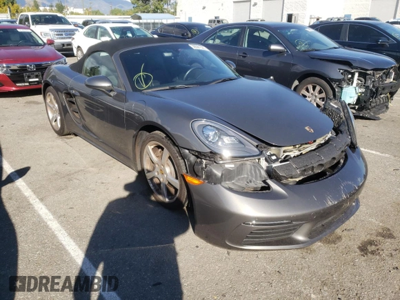 2017 Porsche 718 Boxster z VIN WP0CA2A81HS221942, wystawiony jako Copart lot #36581523 z przebiegiem 73 954 mil mil oraz . Historia ofert i sprzedaży dostępna na DreamBid. Obrazek 4.