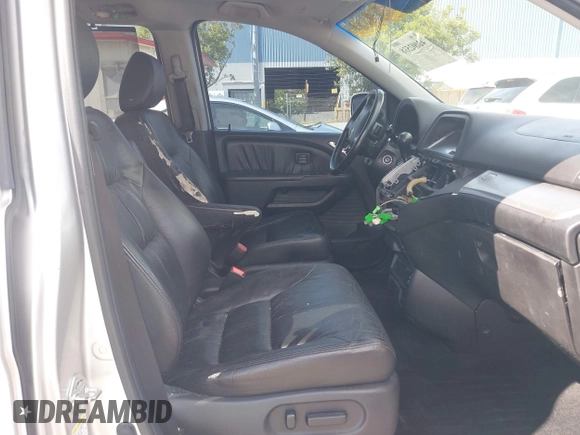 2009 Honda Odyssey Touring с VIN 5FNRL38969B013708, выставлен на аукционе IAAI как лот 42002538 с пробегом 198 220 миль миль и . История ставок и продаж доступна на DreamBid. Изображение 5.