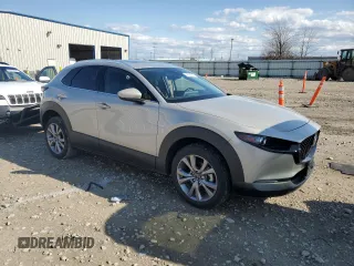 2023 Mazda CX-30 S Premium with VIN 3MVDMBDM6PM525178, listed as a Copart auction lot 54330005 with 21,670 mi miles and Salvage title. Bid and sale history available at DreamBid. Image 4.