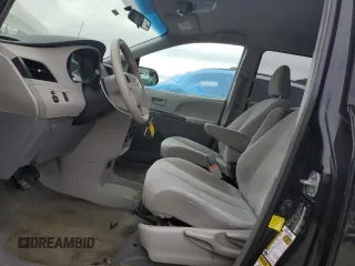2012 Toyota Sienna with VIN 5TDKA3DC5CS013775, listed as a Copart auction lot 46312695 with 218,890 mi miles and Salvage Title. Bid and sale history available at DreamBid. Image 7.