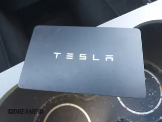 2023 Tesla Model Y Long Range with VIN 7SAYGDEE8PA121218, listed as a IAAI auction lot 41888923 with 34,796 mi miles. Bid and sale history available at carsss.com. Image 11.