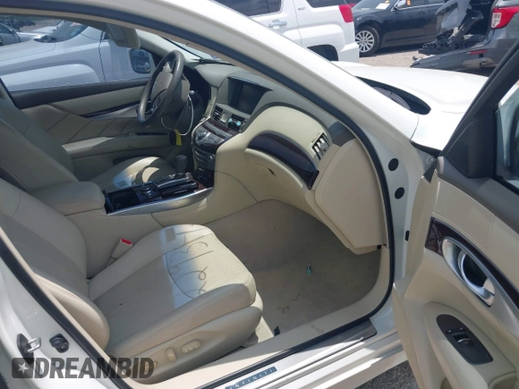 2011 Infiniti M with VIN JN1BY1AP5BM323980, listed as a IAAI auction lot 42293425 with 112,139 mi miles and . Bid and sale history available at DreamBid. Image 5.