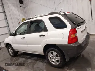 2007 Kia Sportage LX with VIN KNDJF724877399530, listed as a IAAI auction lot 41696698 with 124,967 mi miles. Bid and sale history available at carsss.com. Image 14.