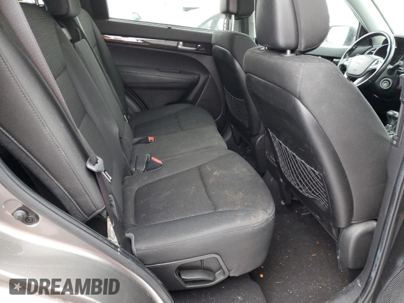 2014 Kia Sorento LX z VIN 5XYKT3A63EG470187, wystawiony jako Copart lot #88716075 z przebiegiem 111 478 mil mil oraz Szkoda całkowita • Salvage title. Historia ofert i sprzedaży dostępna na DreamBid. Obrazek 11.