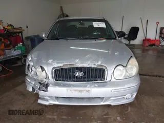 2002 Hyundai Sonata with VIN KMHWF25S42A574561, listed as a IAAI auction lot 41613838 with 141,808 mi miles. Bid and sale history available at carsss.com. Image 13.