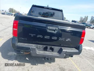 2025 Toyota Tacoma SR with VIN 3TMLB5JN2SM090007, listed as a IAAI auction lot 41830185 with 4,359 mi miles and . Bid and sale history available at DreamBid. Image 16.