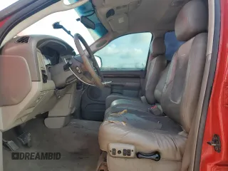2002 Dodge 1500 z VIN 1D7HU18Z52J200116, wystawiony jako Copart lot #60093725 z przebiegiem 267 402 mil mil oraz Szkoda całkowita • Salvage title. Historia ofert i sprzedaży dostępna na DreamBid. Obrazek 7.