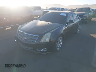 2009 Cadillac CTS RWD w/1SB with VIN 1G6DV57V190118771, listed as a IAAI auction lot 41296579 with 196,482 mi miles. Bid and sale history available at carsss.com. Image 2.