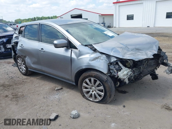 2010 Mazda CX-7 Sport z VIN JM3ER2W59A0301241, wystawiony jako IAAI lot #42215731 z przebiegiem 172 716 mil mil oraz . Historia ofert i sprzedaży dostępna na DreamBid. Obrazek 1.