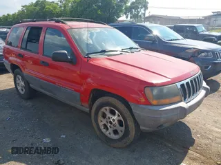 1999 Jeep Grand Cherokee Laredo with VIN 1J4GW58S4XC530278, listed as a IAAI auction lot 42659641 with 289,416 mi miles and . Bid and sale history available at DreamBid. Image 1.