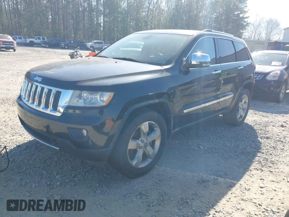 2013 Jeep Grand Cherokee Overland with VIN 1C4RJECG7DC644822, listed as a IAAI auction lot 41658872 with 156,838 mi miles. Bid and sale history available at carsss.com. Image 2.