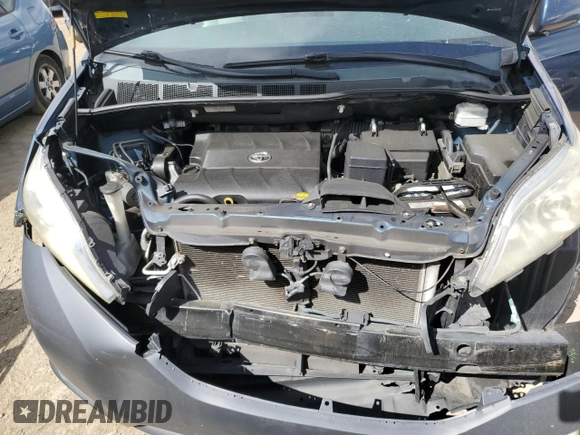 2011 Toyota Sienna LE AAS with VIN 5TDKK3DC6BS063967, listed as a Copart auction lot 56696825 with 196,679 mi miles and Salvage Title. Bid and sale history available at DreamBid. Image 12.