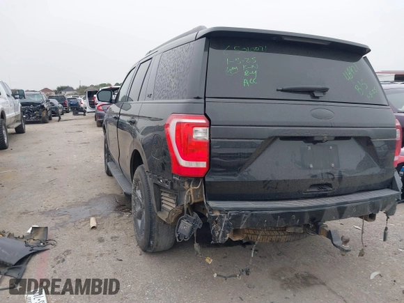 2021 Ford Expedition XL with VIN 1FMJU1FT5MEA84000, listed as a IAAI auction lot 41273172 with 77,049 mi miles. Bid and sale history available at carsss.com. Image 3.