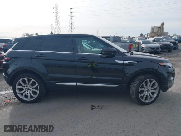 2013 Land Rover Range Rover Evoque Prestige Premium with VIN SALVV2BG8DH808674, listed as a IAAI auction lot 41590565 with 109,191 mi miles and . Bid and sale history available at DreamBid. Image 13.