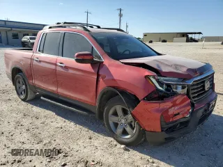 2022 Honda Ridgeline RTL-E z VIN 5FPYK3F7XNB005208, wystawiony jako Copart lot #52327035 z przebiegiem 32 139 mil mil oraz Szkoda całkowita • Salvage title. Historia ofert i sprzedaży dostępna na DreamBid. Obrazek 4.