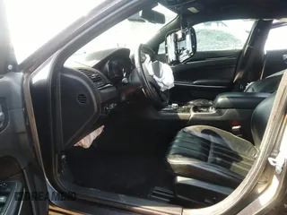 2018 Chrysler 300 with VIN 2C3CCAGG9JH256295, listed as a IAAI auction lot 36763252 with 131,711 mi miles. Bid and sale history available at carsss.com. Image 5.